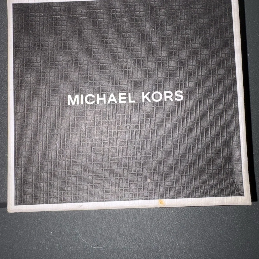 Michael Kors Black Wallet with Silver Brand Lettering with Belt Clip